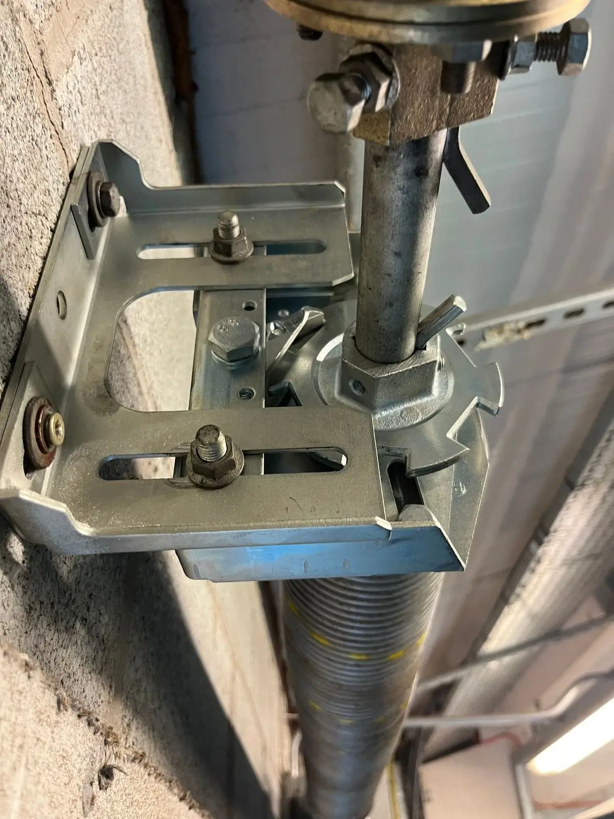 Roller shutter spring and bracket close-up