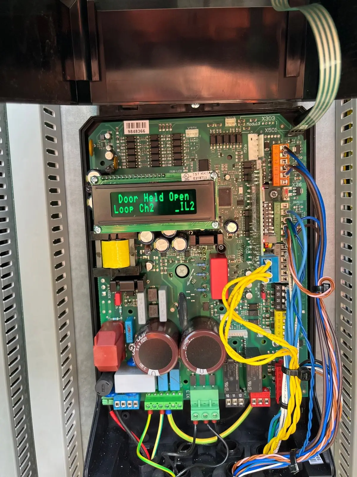 Control board display reading Door Held Open and Loop Ch2
